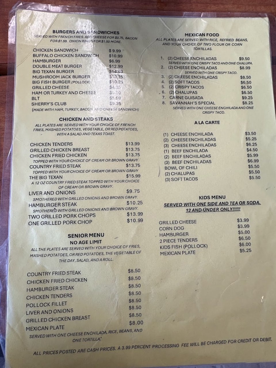 Printed menu with seafood plates and burgers.
